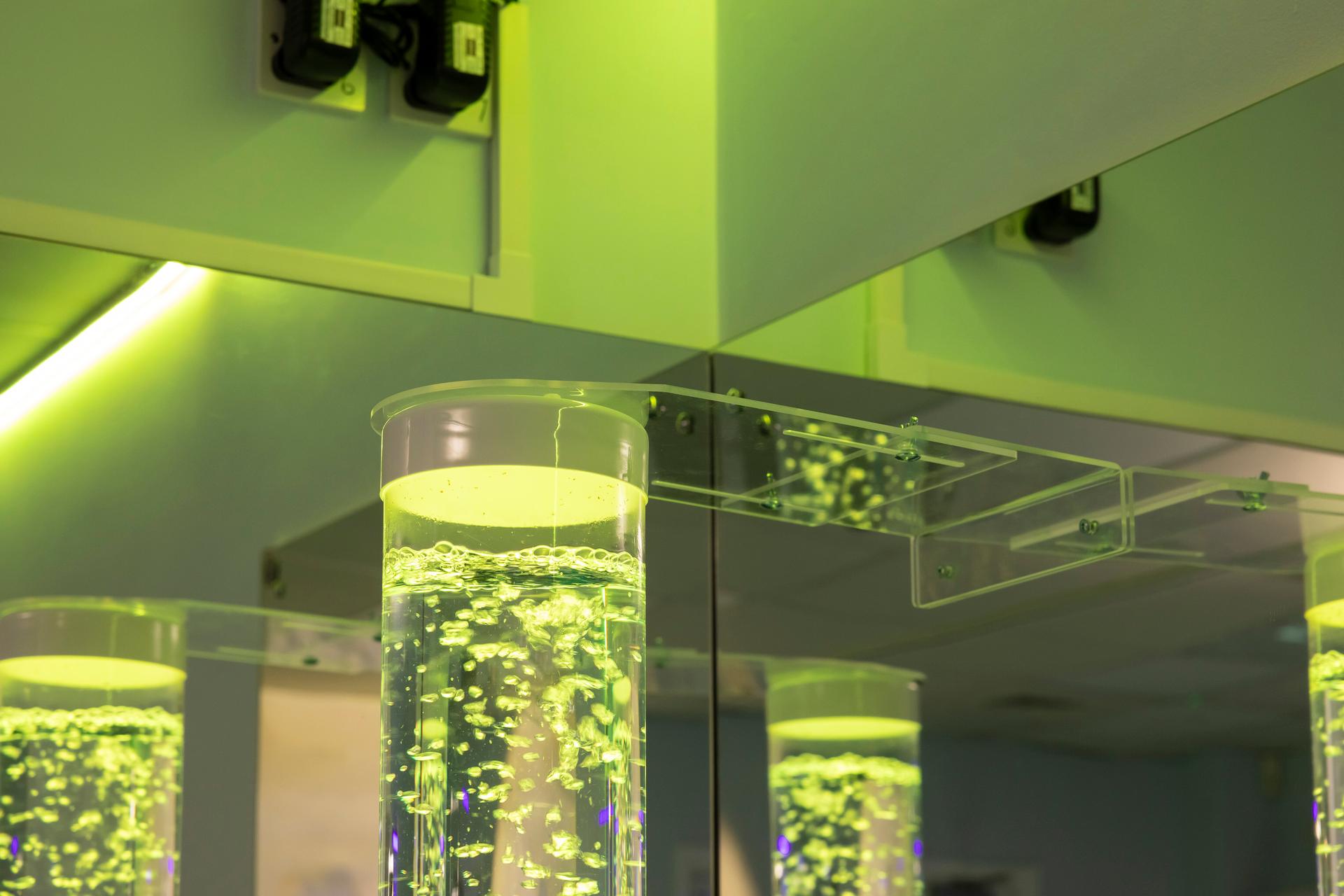 Bubble tube bracket attached to a wall.