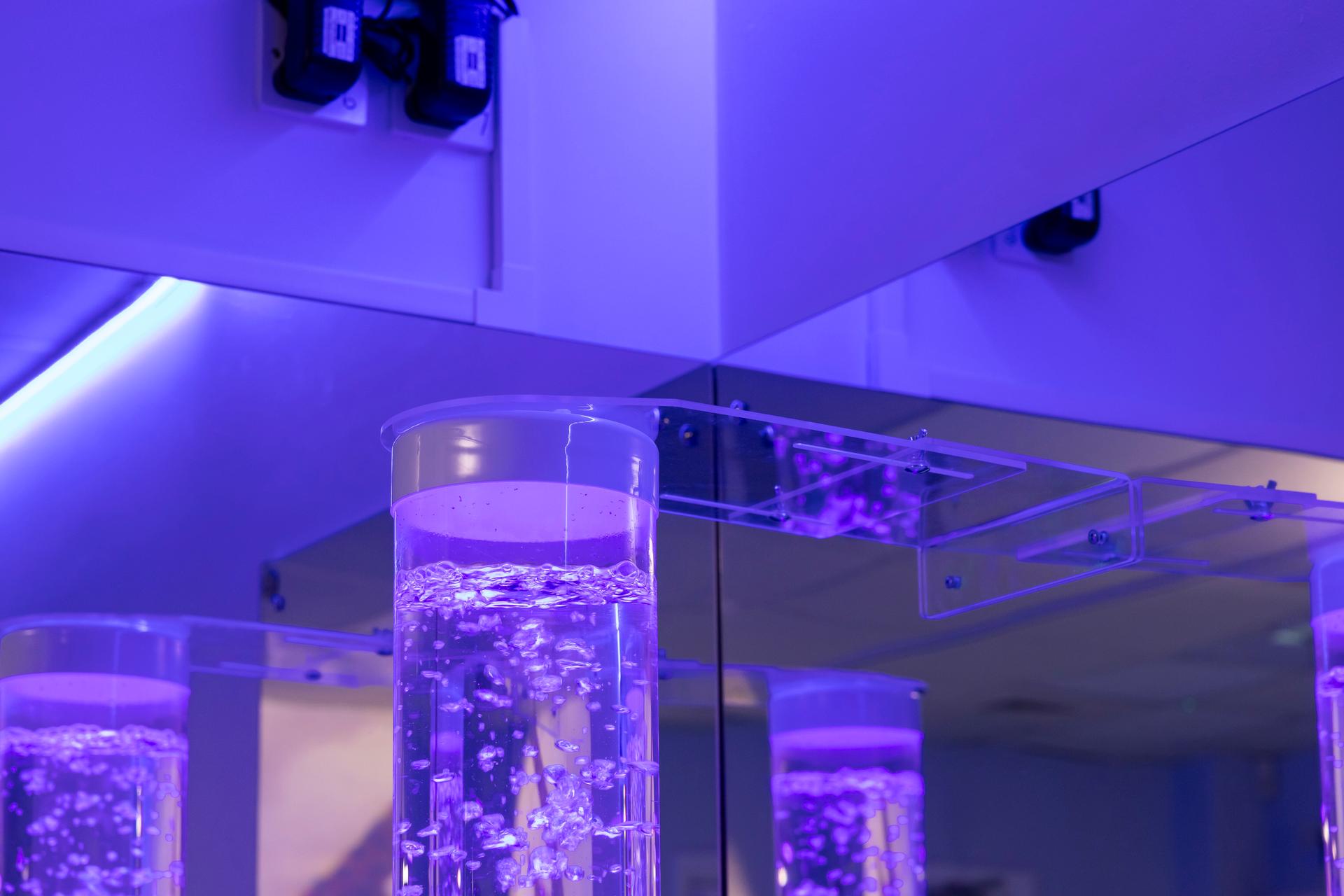 Bubble tube bracket attached to a wall.