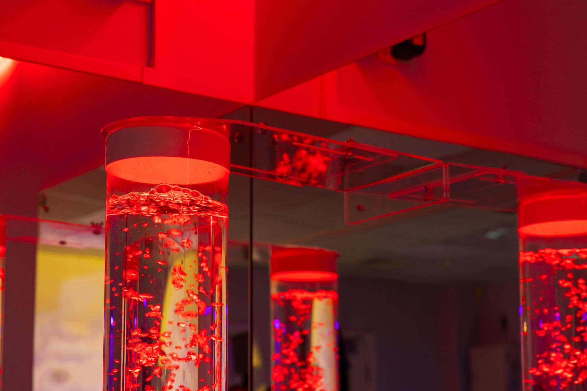 Bubble tube bracket attached to a wall.