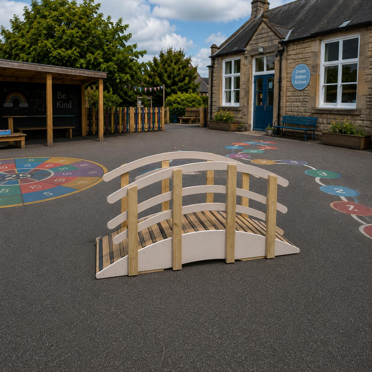 A Play Bridge with Handrails placed on a school playground.