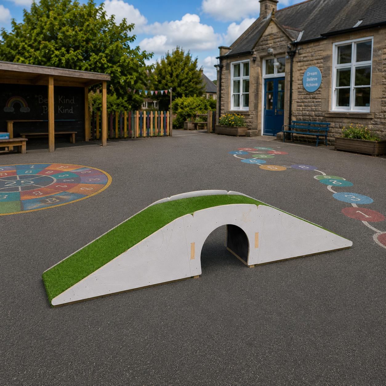 3D render image of the Up and Under Blocks Ramp & Ramp on a school playground.