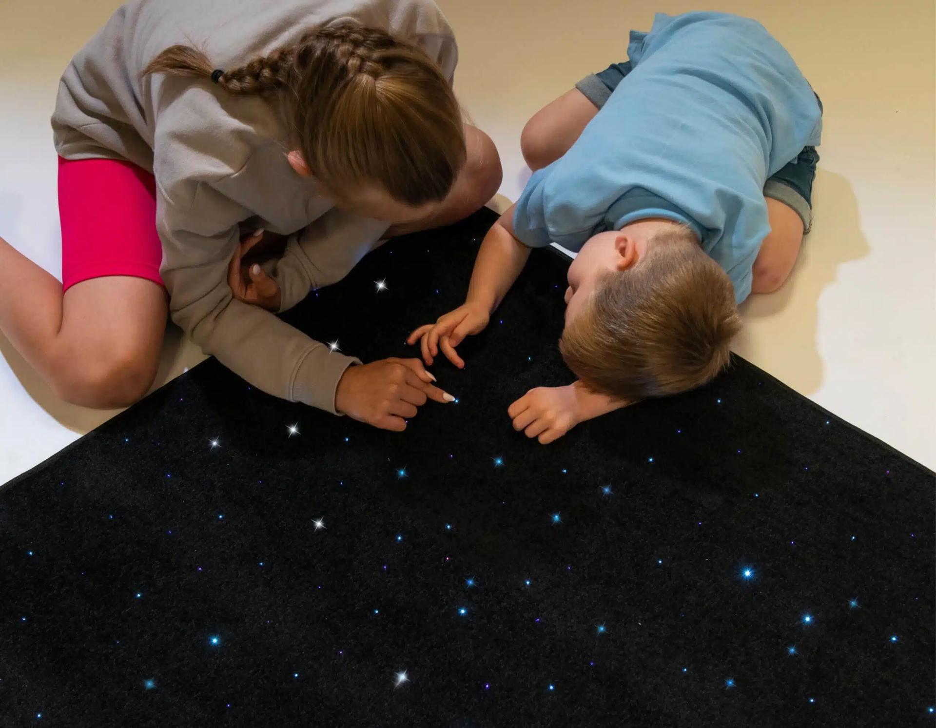 fibre optic carpet with children