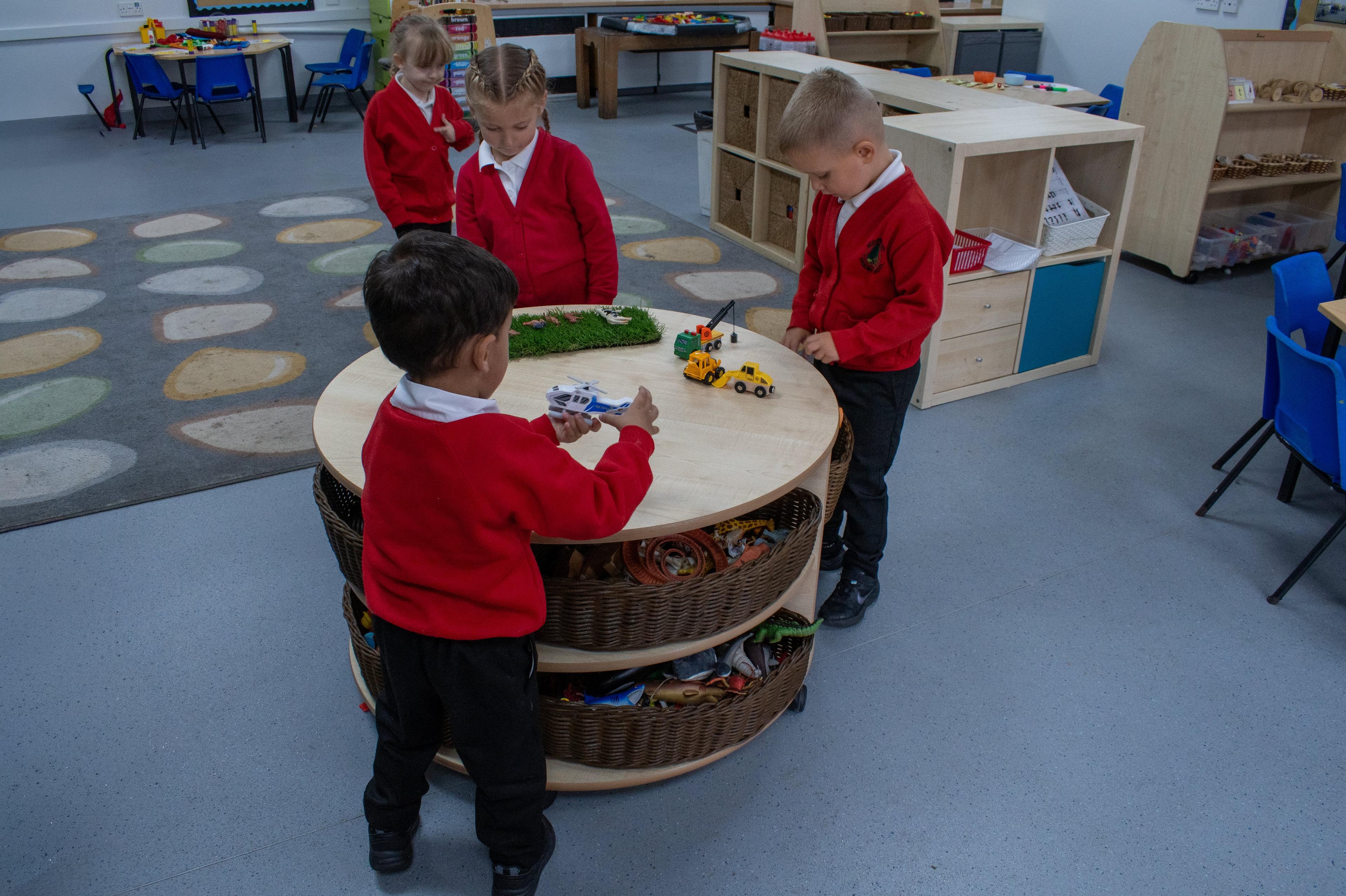 children playing on the circular storage unit