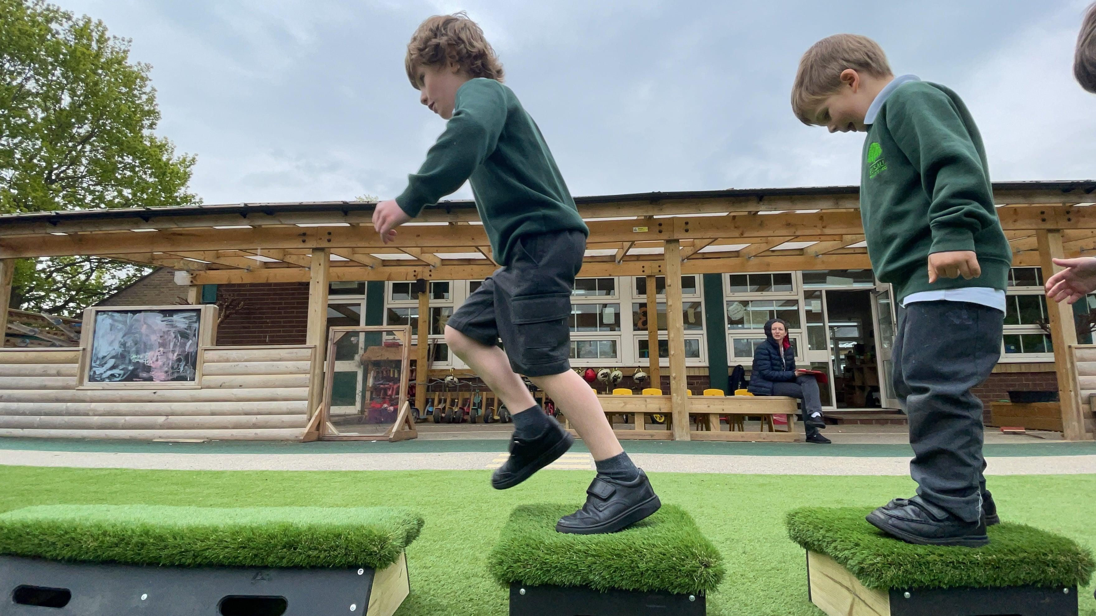 Boy jumping across Get Set Go Blocks.