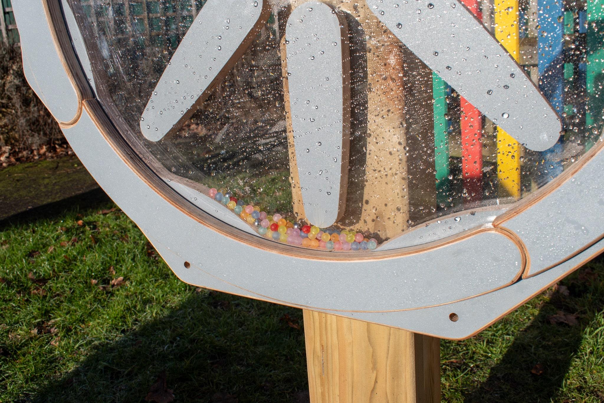 The beads that are within the Sound Sensory Spinner.
