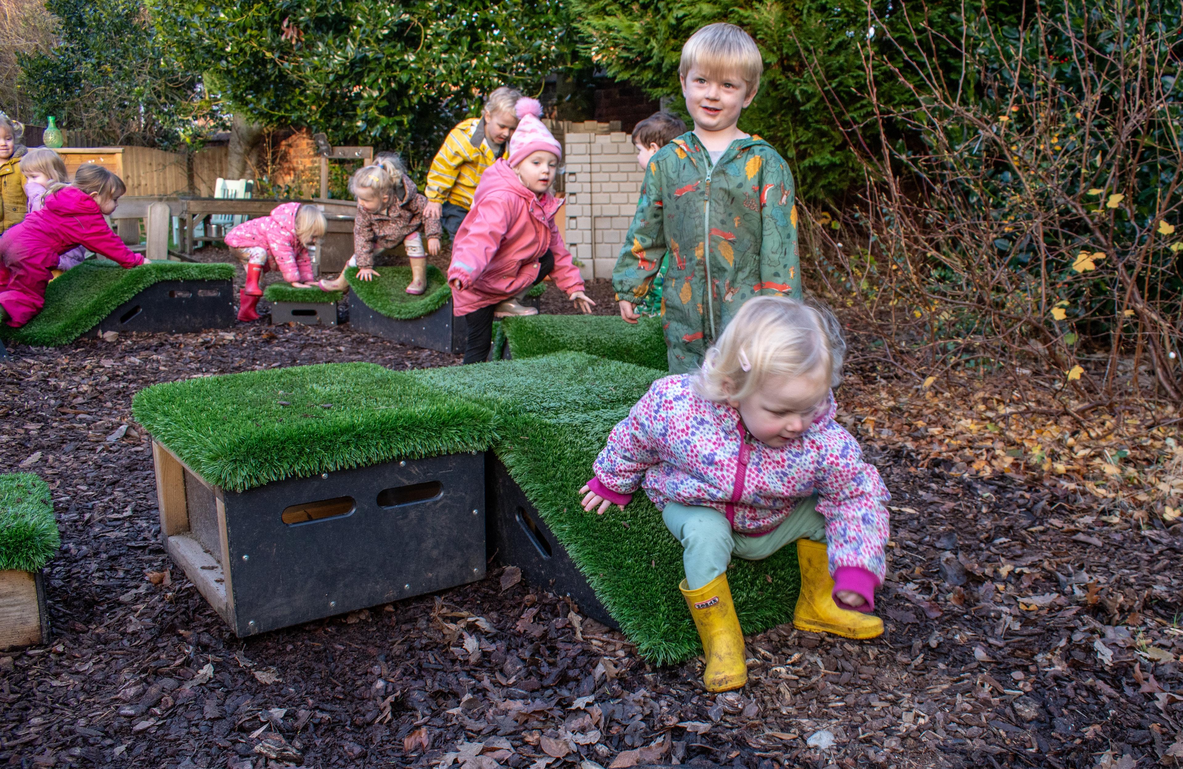 Nursery children slidingdown Get Set, Go! Blocks, part of the Sports Premium Adventurer Package