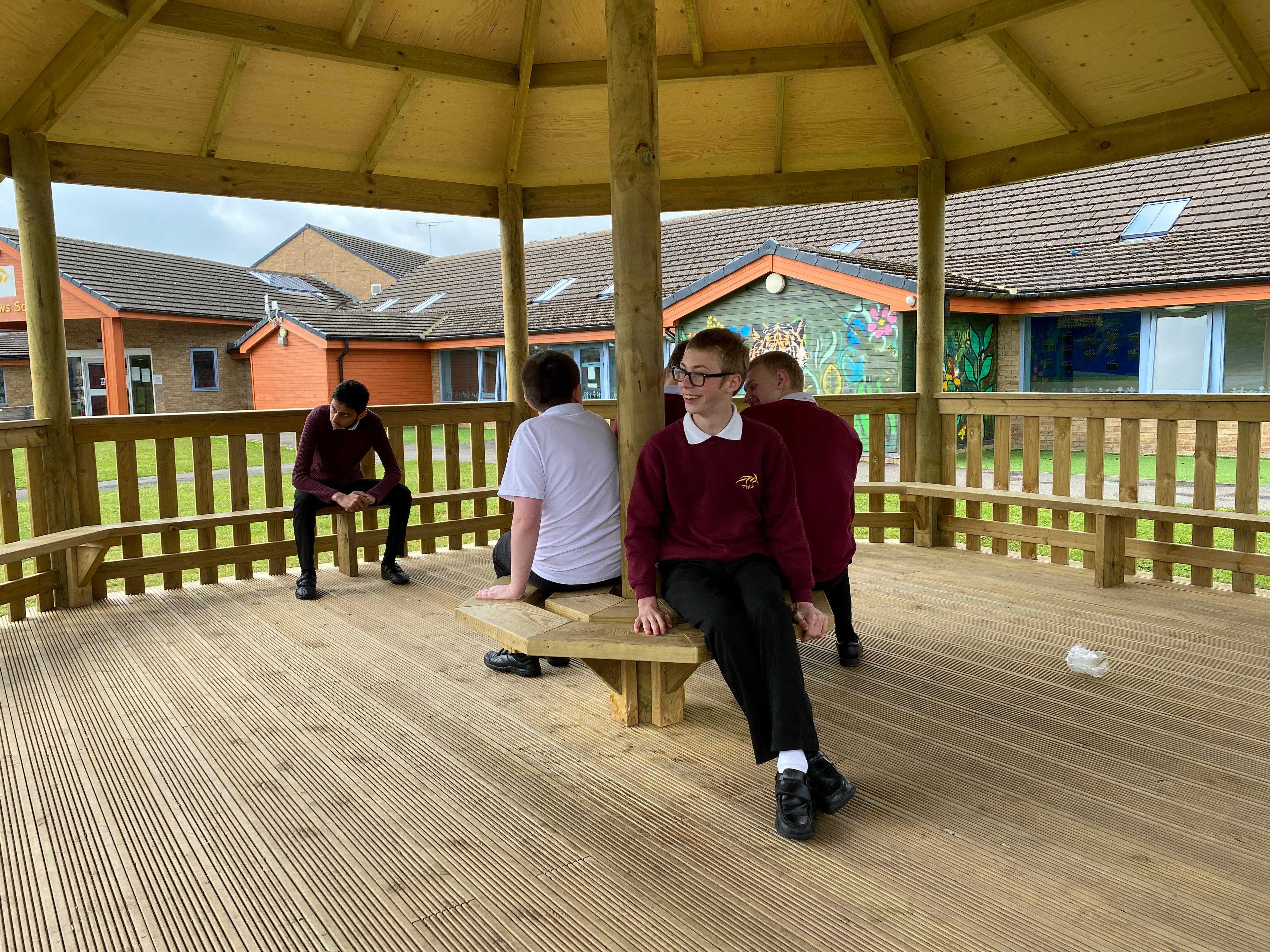 7.5m wooden gazebo in a school playground.