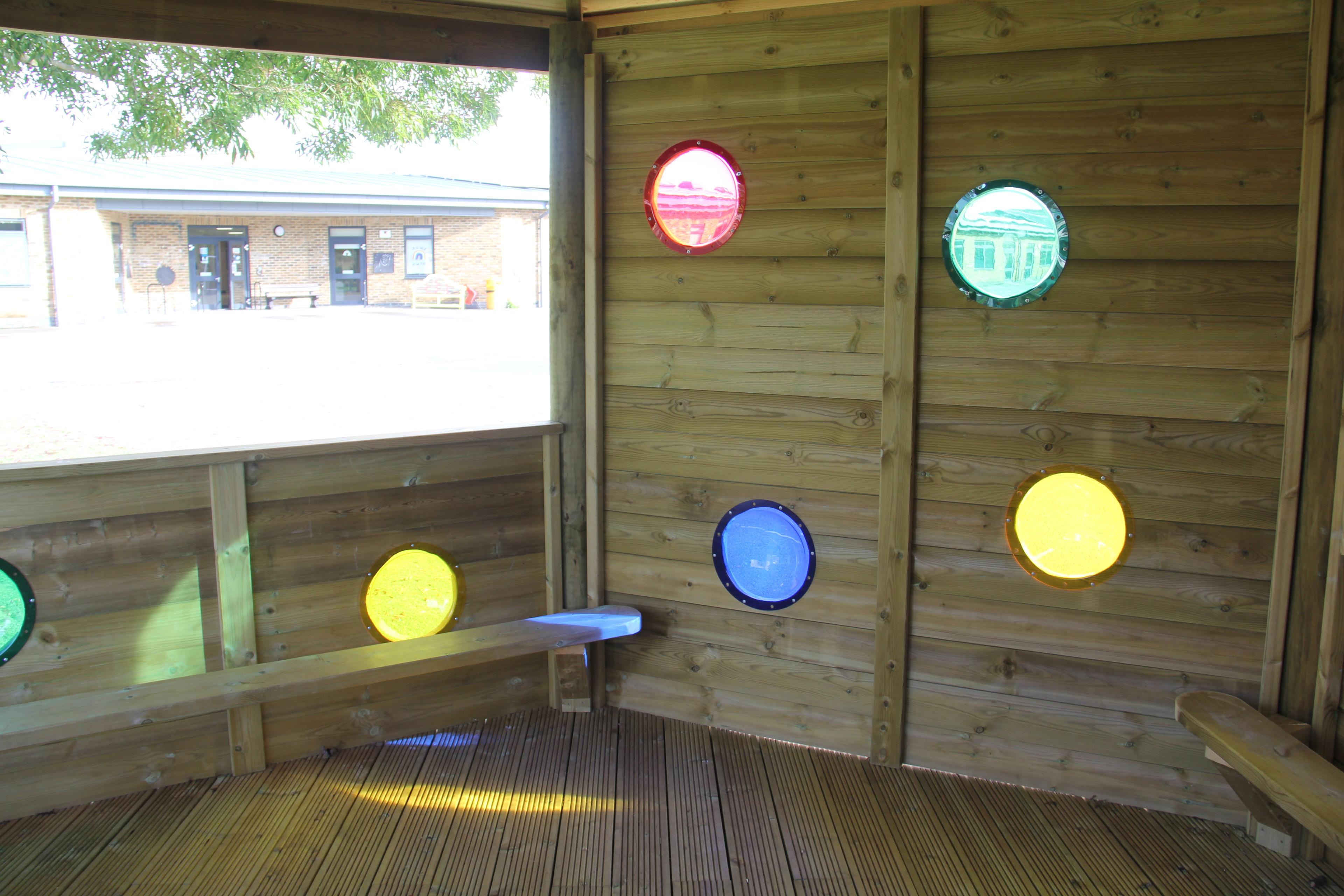 A close up of the coloured sensory panels inside the Sensory 5M Hexagonal Gazebo
