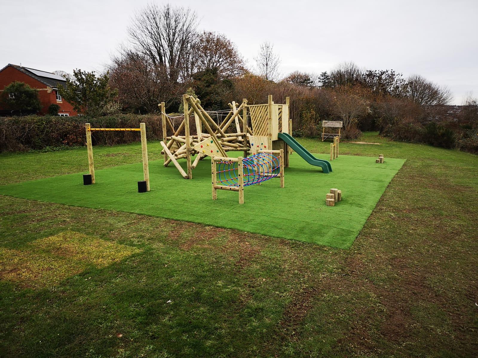 Crinkle Crags Climber with Platform and Slide in a playground