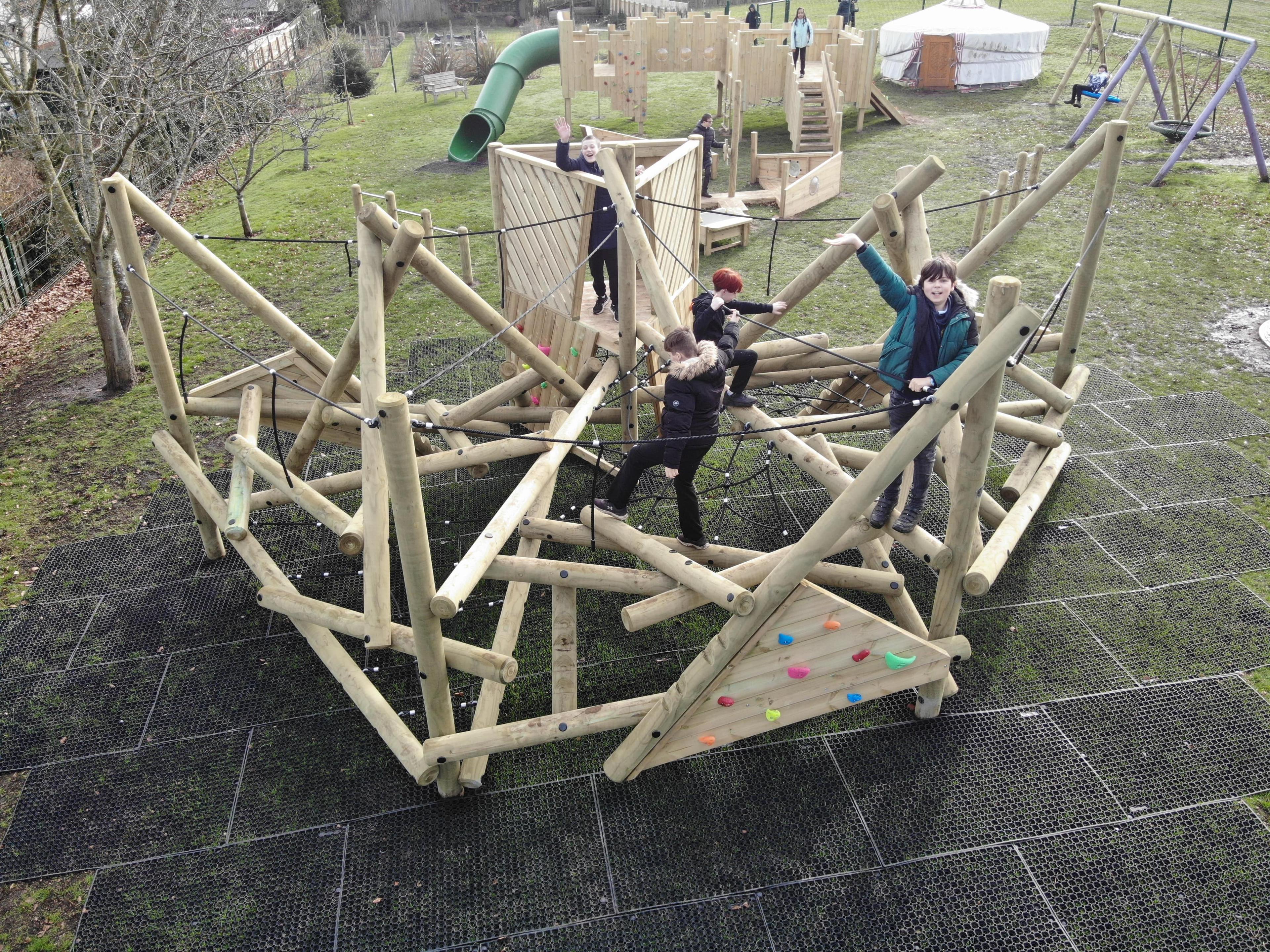 Children climbing the Crinkle Crags Climber with Platform and Climbing Net.