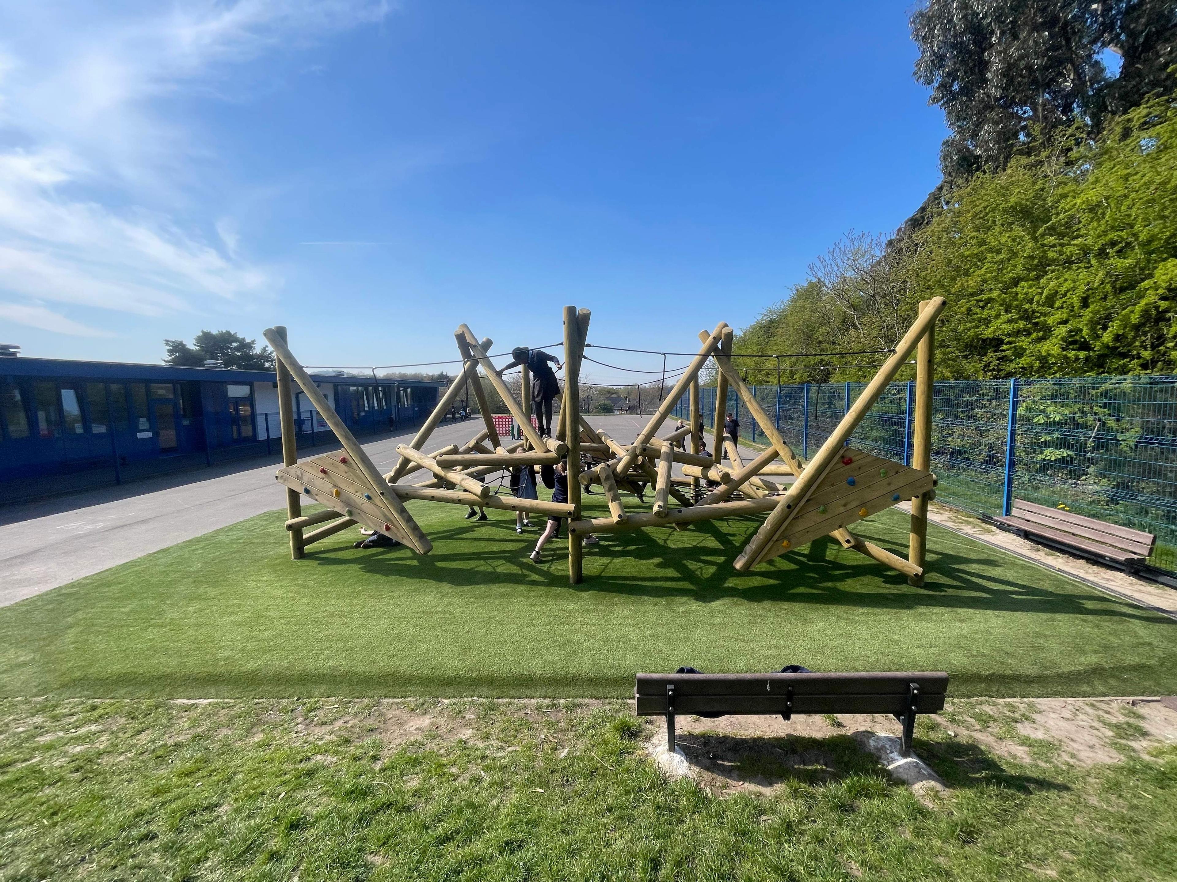 Crinkle Crags Climber with Platform and Climbing Net on an artificial grass surface.