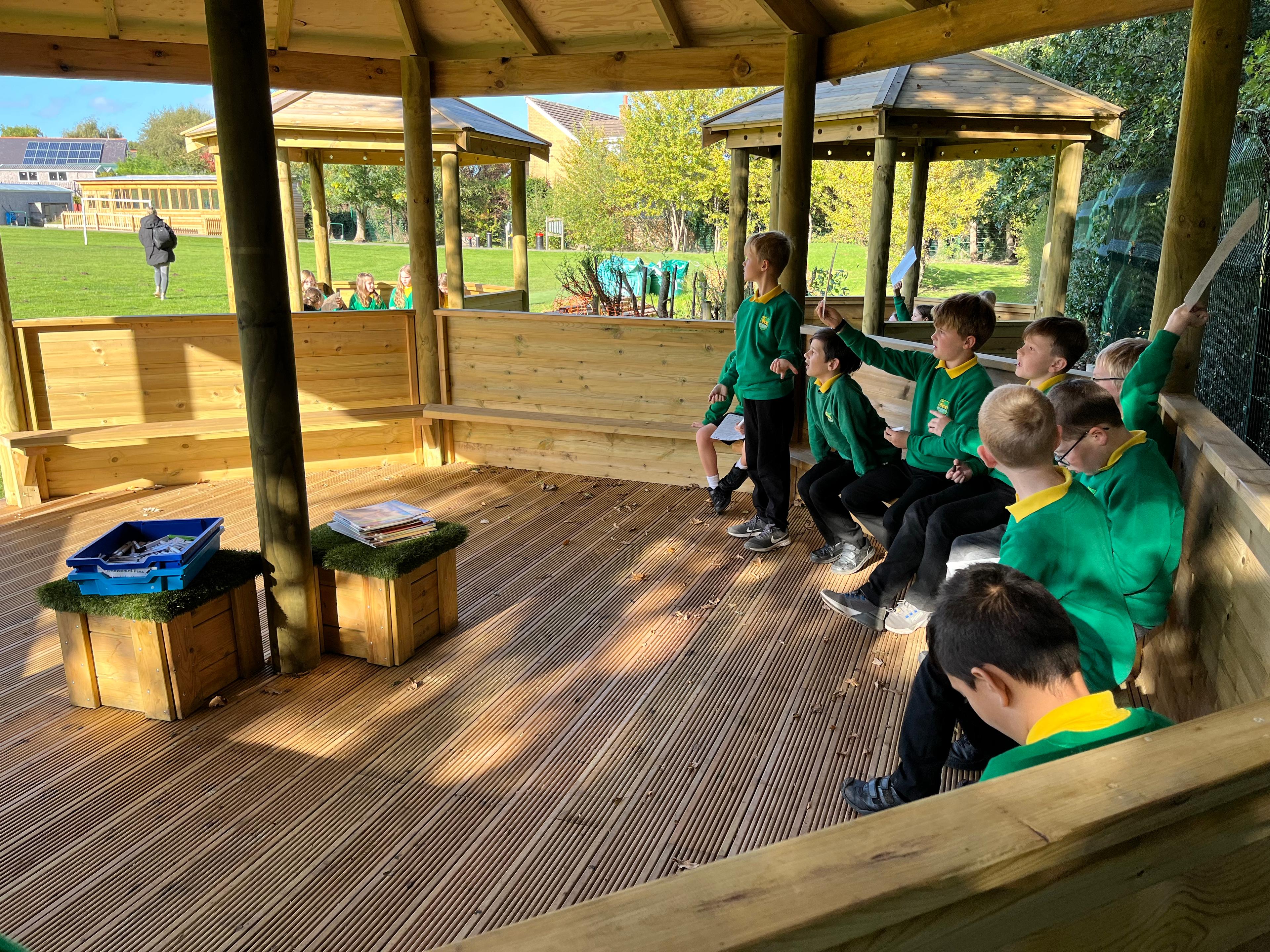 7.5m wooden gazebo in a school playground.