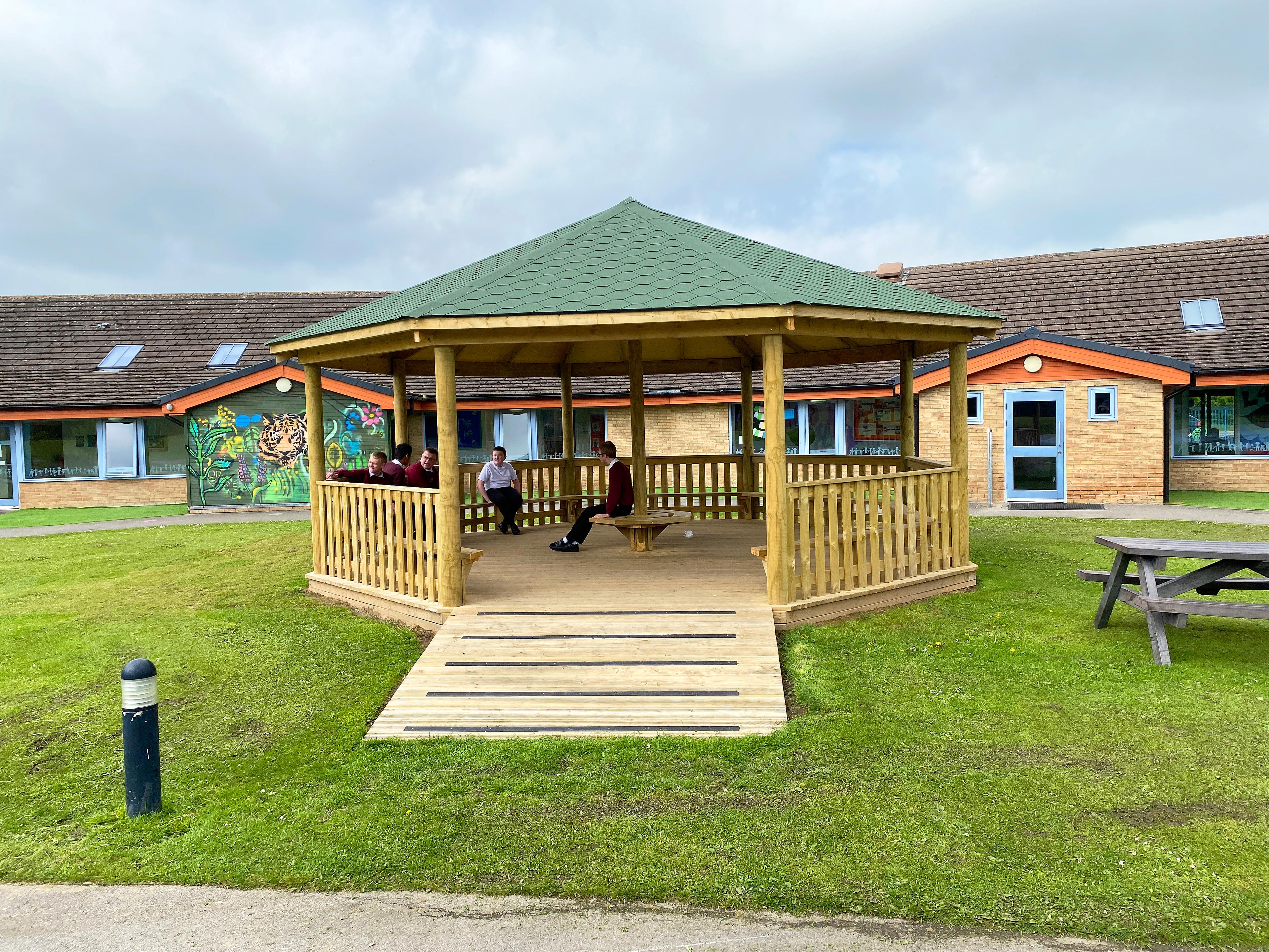 7.5m wooden gazebo in a school playground.