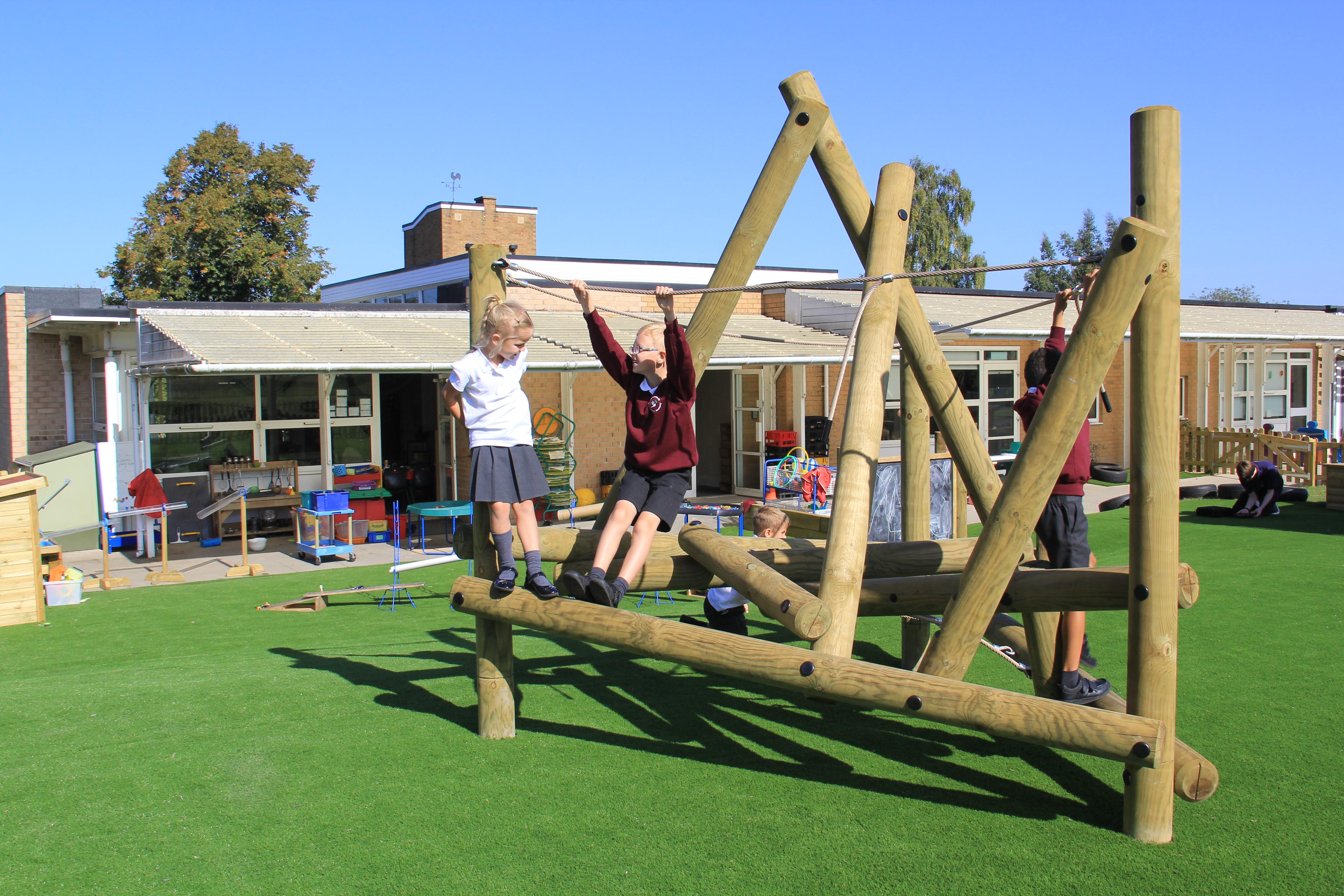 Harter Fell Wooden Climber in primary school playground.