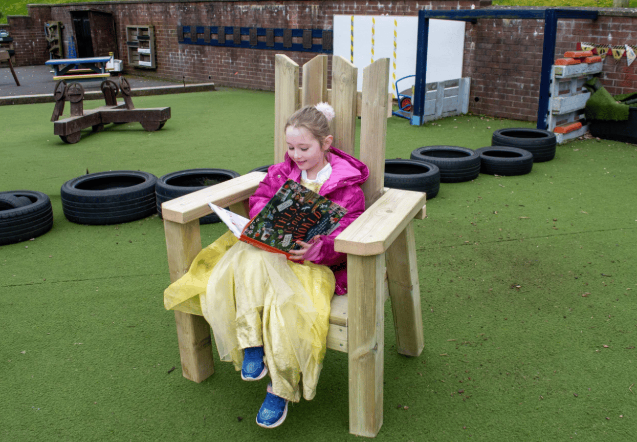 A Pentagon Play bespoke School Playground Scheme with children playing on the playground