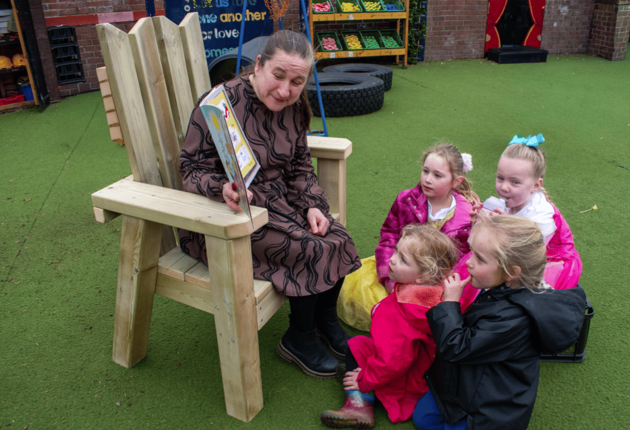 A Pentagon Play bespoke School Playground Scheme with children playing on the playground