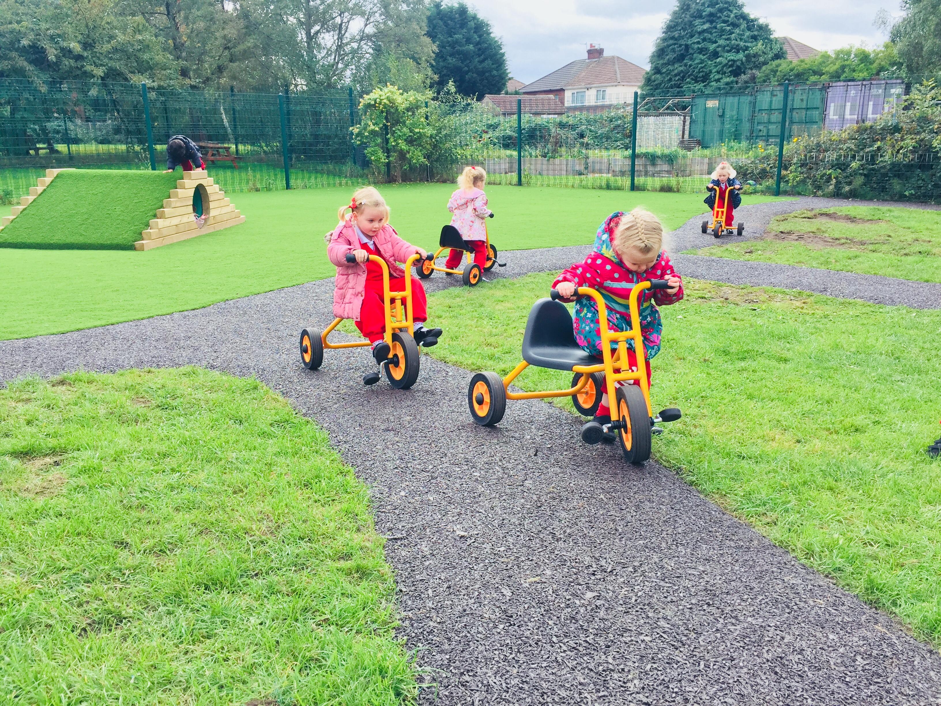 A Pentagon Play bespoke School Playground Scheme with children playing on the playground