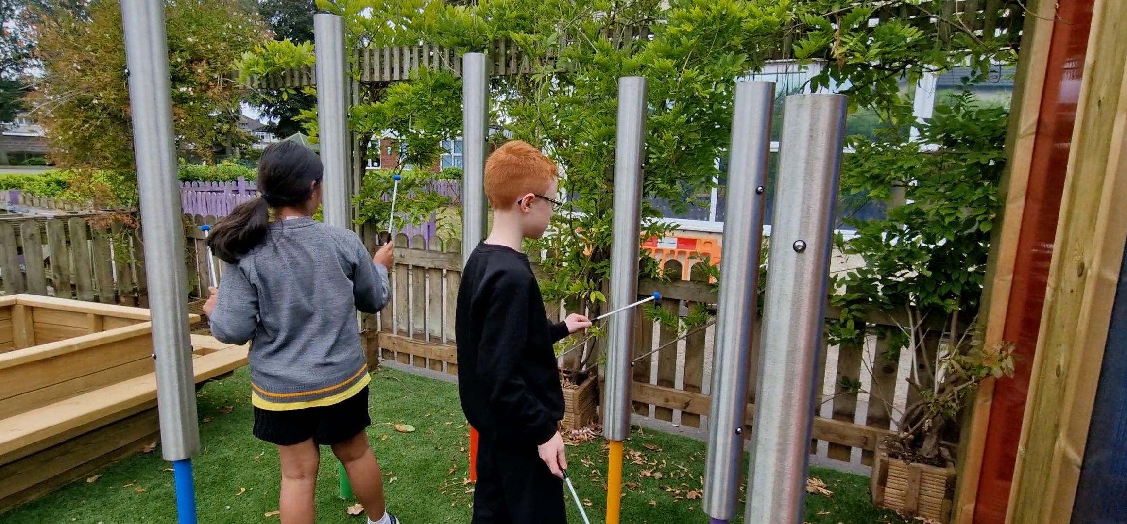 Children playing on Major Pentatonic Chimes