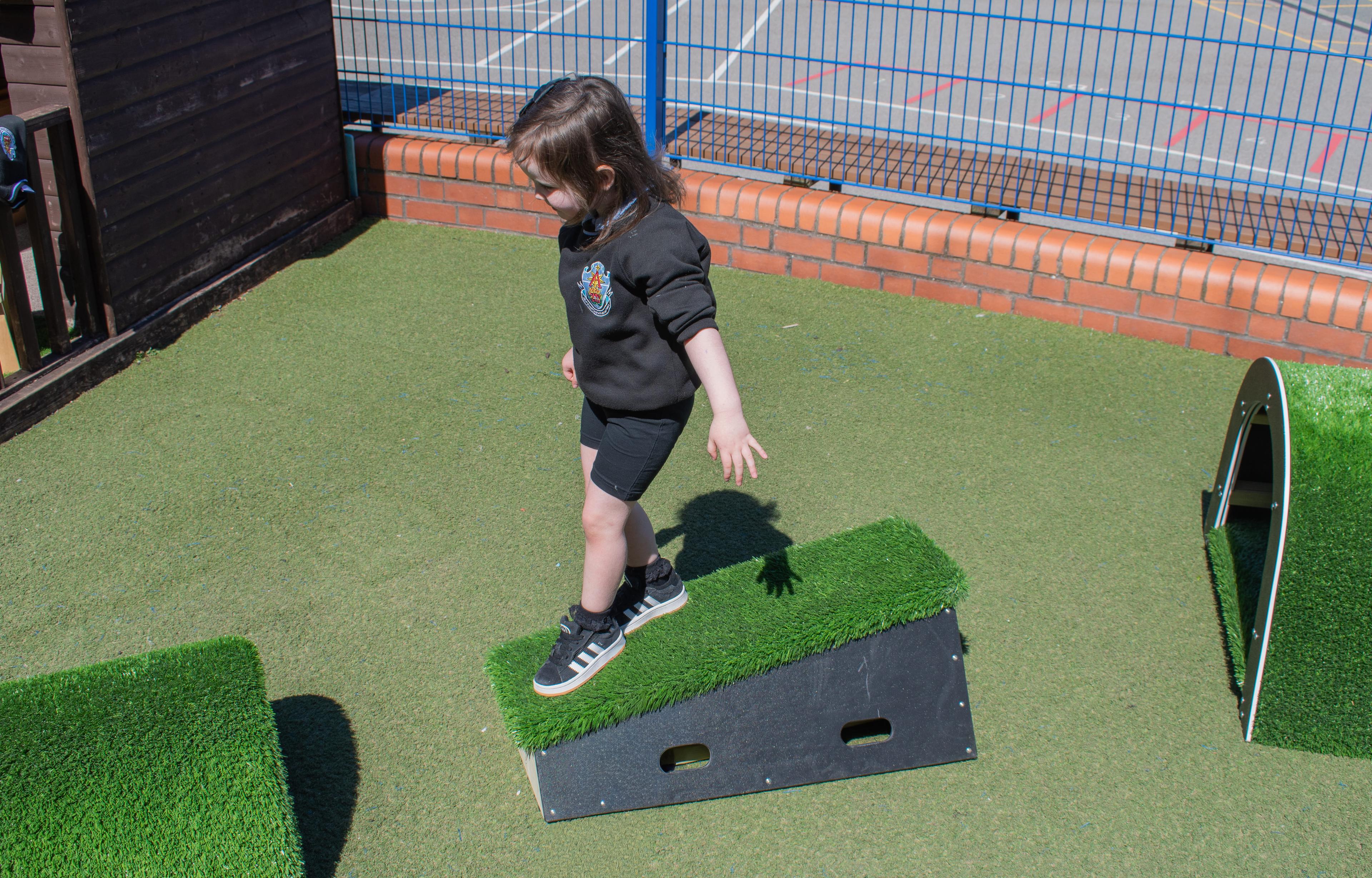 An angled balance block that is included within the Get Set, Go! Blocks - Next Steps package.